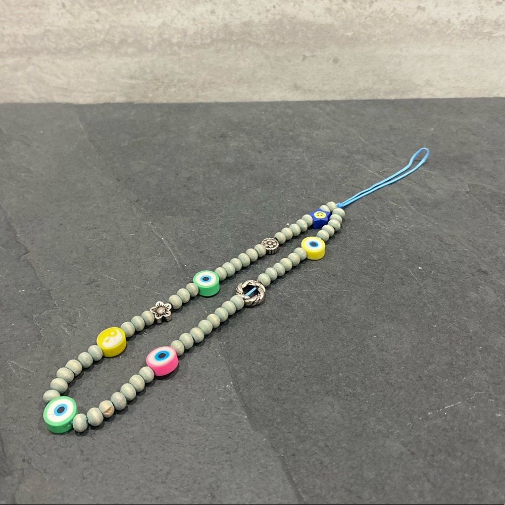 cute urban outfitters phone bracelet
